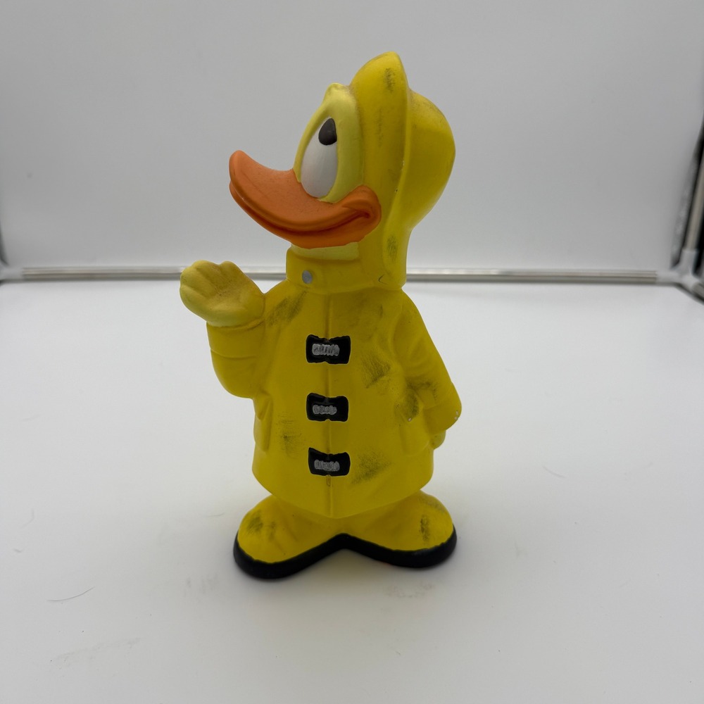 Vintage Disney Donald Duck Figurine Yellow Raincoat Slicker Rubber 7.5 Inch